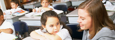 child looking at woman